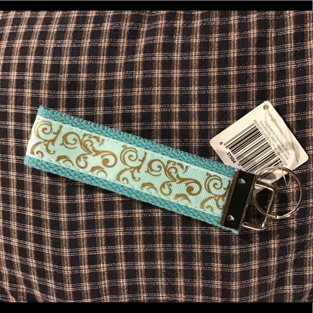 Blue with gold print wristlet keychain NWT!